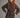#color_brown | Girl wearing a matching set of a plaid blouse and skirt
