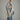#color_grey | Boy wearing a bamboo shirt jacket with corduroy pants and holding a racket