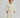 #color_ivory | Toddler boy wearing an ivory white organic cotton quilted set with a sweatshirt and pants