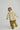 Toddler girl wearing GOTS-certified organic cotton corduroy pants in green from Cozmo - Pantalones de Pana Ancha para Bebé - Bebé 