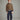 #color_navy-biscuit | Boy wearing a cotton polo sweater in navy and brown with blue pants