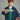 #color_grass | Boy wearing a corduroy shirt in green hues paired with red pants and a blue jacket