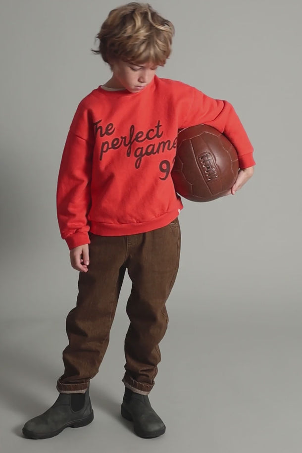 #color_brown | Boy wearing soft cotton denim jeans for boys in brown from Cozmo in a Fall outfit